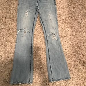 Low Rise Distressed Ankle Flare Jeans